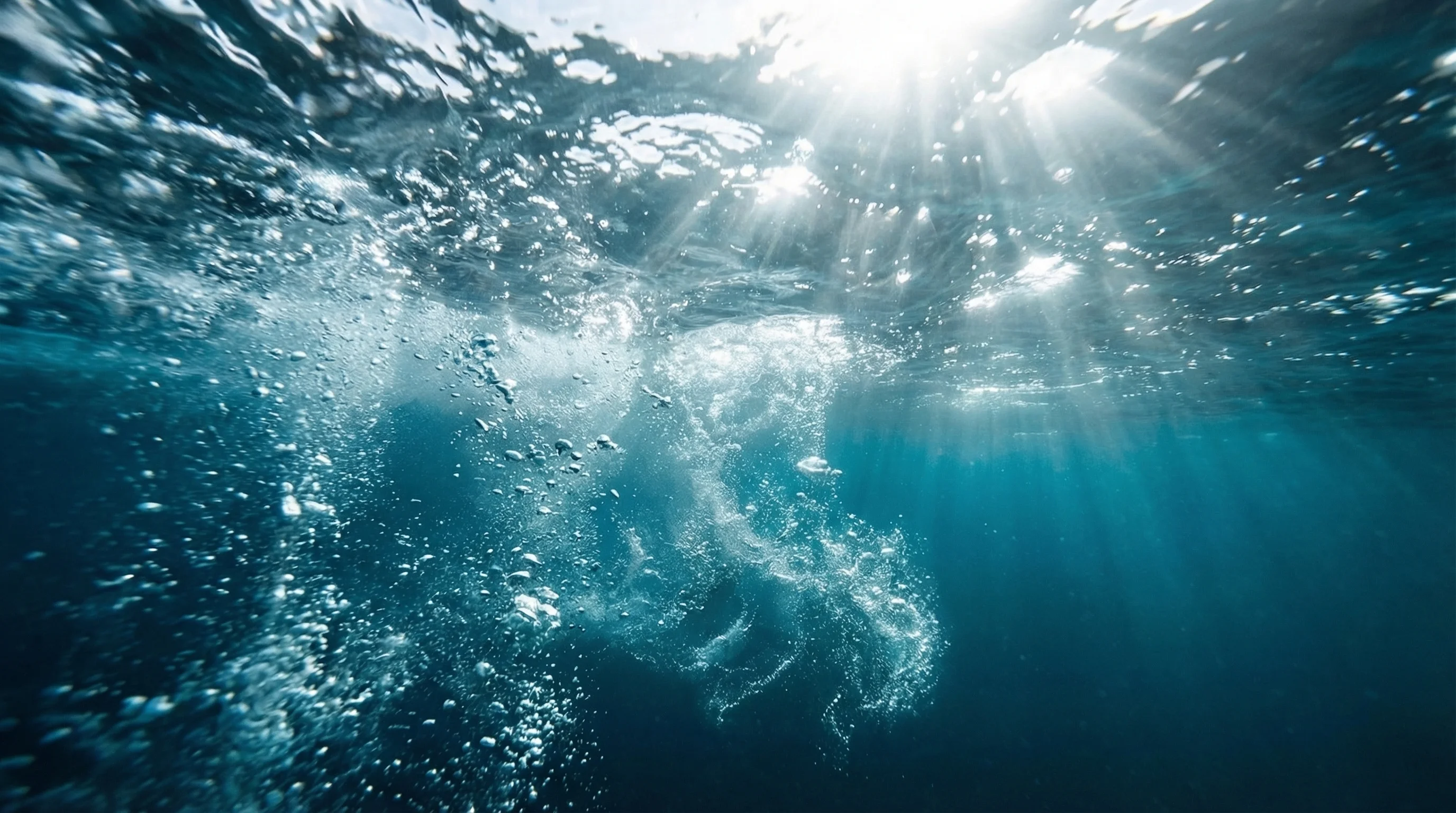 Underwater view of rushing water — the force behind hydroelectric power